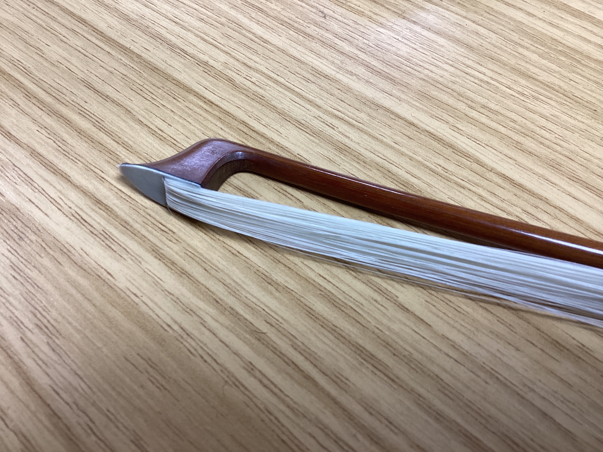 15 1/4 inch viola, cased, circa 1880 and a silver mounted bow with ivory tip, viola 65 cms long